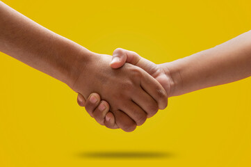 Child hand shaking gesture on yellow banner template
