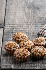 Nutty tarts on rustic wooden table