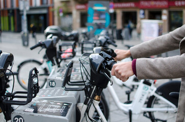 Fototapeta na wymiar Renting bikes in the city, a healthy transport concept 