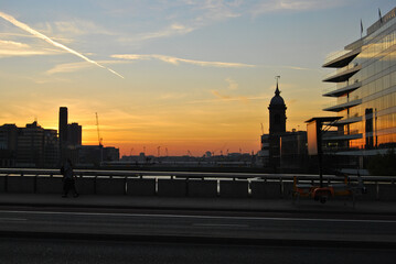 Fototapeta na wymiar Urban sunset with silhouette and red sky