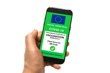The digital green pass of the European Union on the screen of a smartphone held by hands isolated...