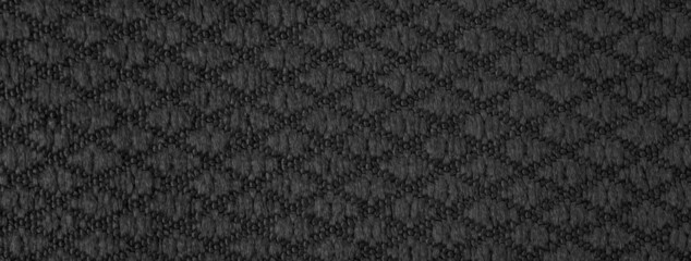 black cotton material with an interesting pattern