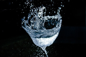 Splashing water from exploding water balloon freezed with high shutter speed