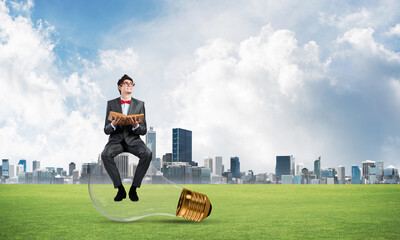 young businessman with a book