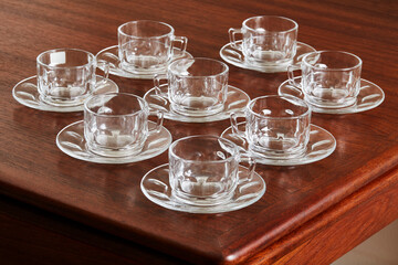 Glass teacup set. Vintage clear cups with saucers. 