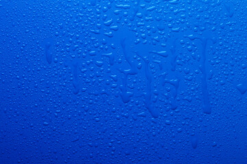 Water drops on blue color  surface