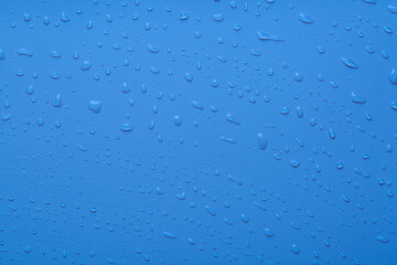 Water drops on blue color  surface