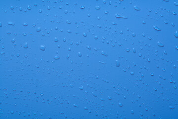 Water drops on blue color  surface