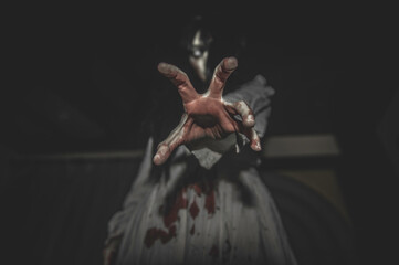 Fototapeta premium Portrait of asian woman make up ghost,Scary horror scene for background,Halloween festival concept,Ghost movies poster