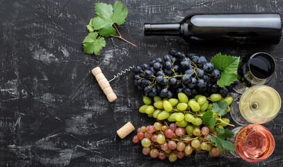 Assortment different types of wine and grade varieties. Tasting White rose red wine in glasses near white pink and black grapes, red wine bottle on dark concrete background. Long web banner