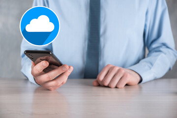 Businessman hold cloud icon.Cloud computing concept - connect smart phone to cloud. computing network information technologist with smart phone.Big data Concept.flat icons with long shadows