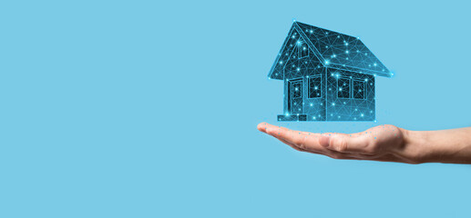 Man hold low polygon.Real estate concept, businessman holding a house icon.House on Hand.Property insurance and security concept. Protecting gesture of man and symbol of house