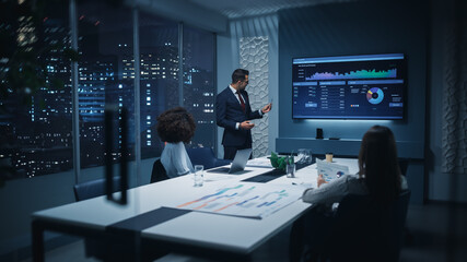 Office Conference Room Meeting: Diverse Team of Top Managers Talk, Discuss, Brainstorm, Use Laptop...