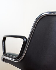 Midcentury Modern Green Leather Pollock Office Desk Chair on wheels with houseplant for luxury furniture brand