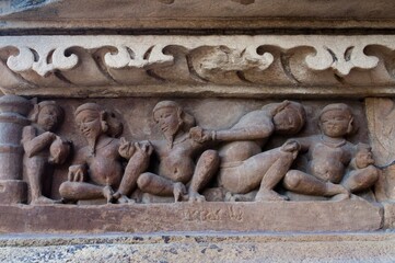 Human Sculptors made of stone depicting domestic life, at Vishvanatha Temple, dedicated to Lord Shiva, Western Temples of Khajuraho, Khajuraho, Madhya Pradesh, India. UNESCO heritage site.