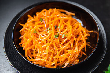 carrot salad fresh vegetable beta carotene spicy spices healthy meal food snack on the table copy...