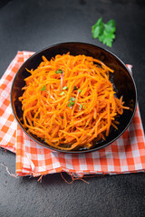 carrot salad fresh vegetable beta carotene spicy spices healthy meal food snack on the table copy...
