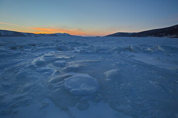 Naklejka na ściany i meble Ice of the Nagaevskaya Bay in the city of Magadan.
