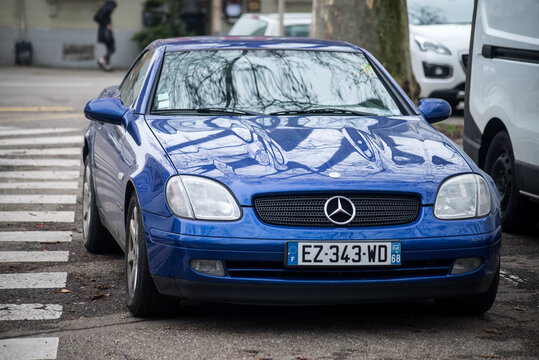 Mulhouse - France - 11 January 2022 - Front view of blue Mercedes 330 SLK Kompressor parked in the street