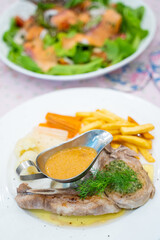 pork chop steak with black pepper sauce