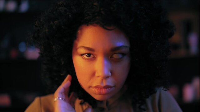 Fortune teller with creepy dead eye looking into camera, witch practicing magic. Medium, psychic, witch, oracle. Paranormal events