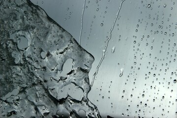ice and water drops on sky background