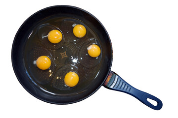 Raw eggs on the old skillet, top view, white background