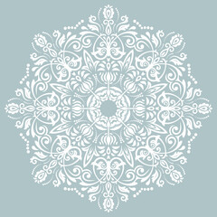 Oriental vector round white pattern with arabesques and floral elements. Traditional classic blue and white ornament. Vintage pattern with arabesques