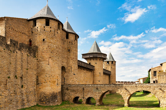 view of the castle at walled city (La Cit&eacute; in french) of Carcassonne in France - sunset sky.