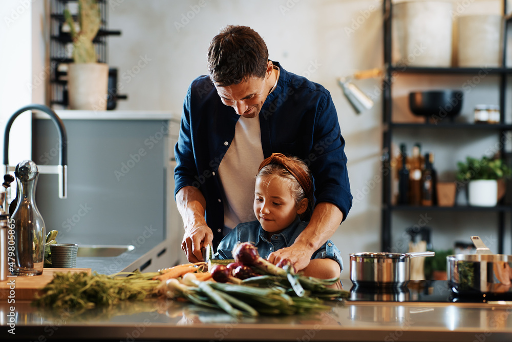 Wall mural father and daughter chopping vegetables - Wall murals