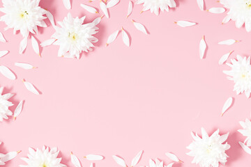 Beautiful flowers composition. Spring minimal concept. White flowers on pastel pink background....