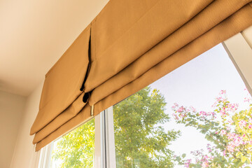 Roman blind curtain decoration in living room interior