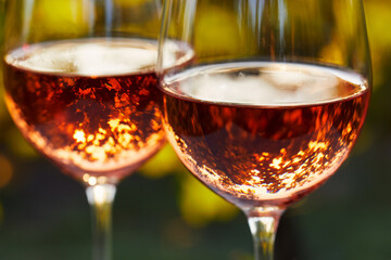Two glasses full of rosé wine up close