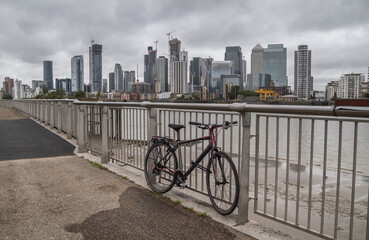 Canary Wharf financial district on the Isle of Dogs seen from the Greenwich Peninsula. Skyscrapers...