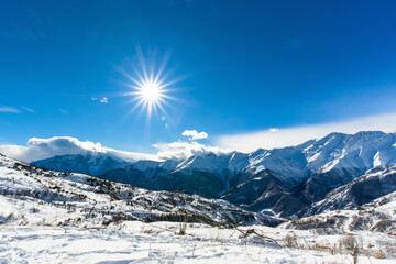 Fototapeta na wymiar north Ossetia is mountainous in winter. Snowy mountain landscape. panorama of the winter landscape. resort area. rocks panoramic view