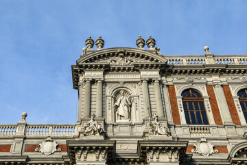 Fototapeta na wymiar Detail of the façade of Palazzo Carignano overlooking Piazza Carlo Alberto in the historic centre of Turin, Piedmont, Italy