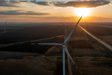 Energy. Wind turbines at dusk at sunset