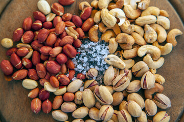 Beer snack, platter of pistachios and salted peanuts