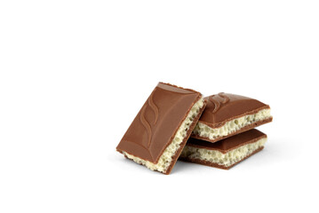 White in black porous chocolate on white background.