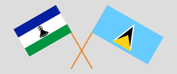 Crossed flags of Lesotho and Saint Lucia. Official colors. Correct proportion