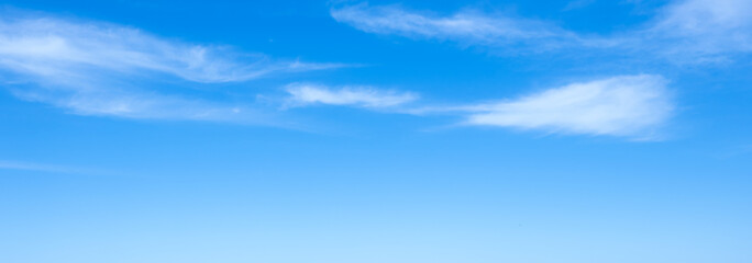 Naklejka na ściany i meble Sky blue with white cloud background. banner