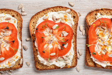 Toasts with cream cheese and vegetables