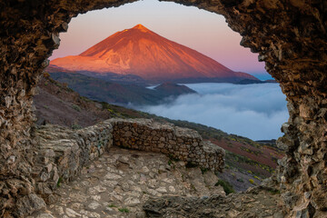 Teide volcano on Tenerife visible from the rock cave