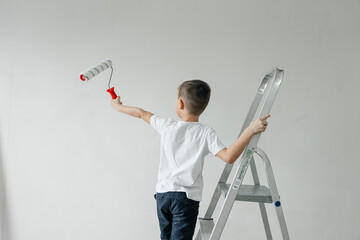 boy painting the wall