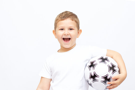 Fan sport boy player hold soccer ball celebrating happy smiling laughing free text copy space isolated on white background