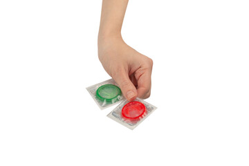 Condom in woman hand isolated on white background.