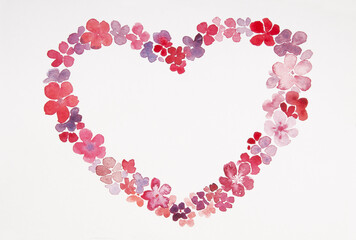 Watercolor illustration in the shape of a heart made of flowers in red shades.