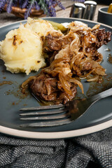 Fried liver with onion.