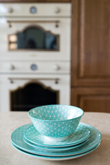 tableware on a blurred background of vintage kitchen interior - selective focus