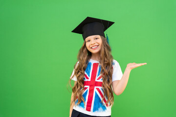 a small, beautiful graduate with an English flag on her T-shirt holds an advertisement on her hand....